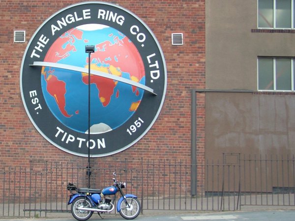 Parked beneath the aptly named "Tit on the wall" in Tipton.